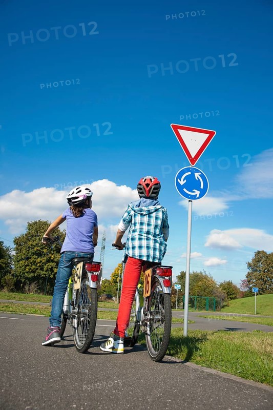Children on bicycles at a traffic awareness course