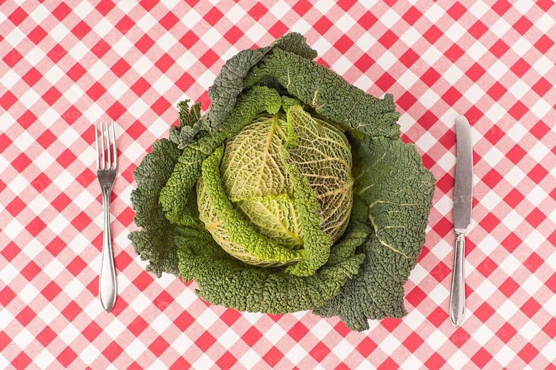 Savoy cabbage with knife and fork