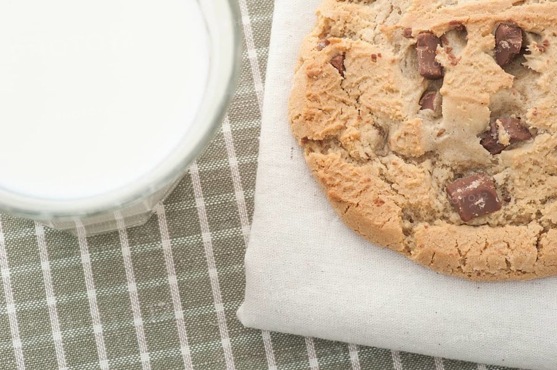 Chocolate chip cookie and a glass of milk
