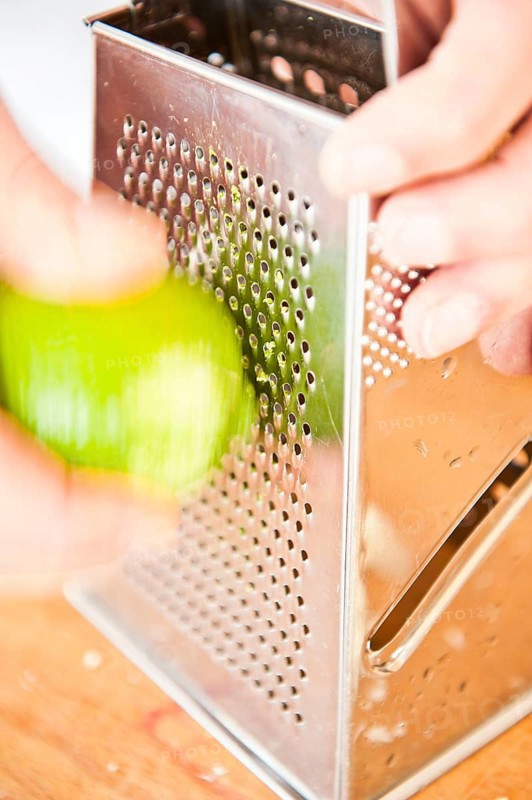 Grating lime peel with a grater