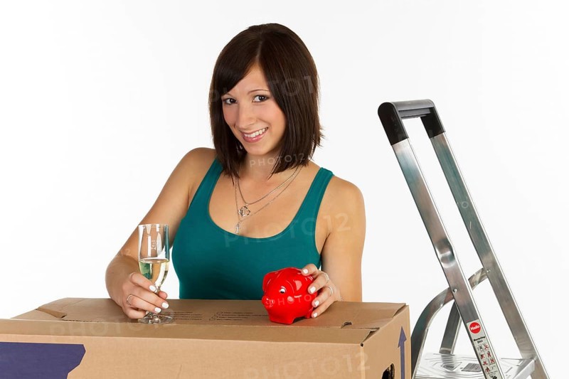 Young woman with a moving box