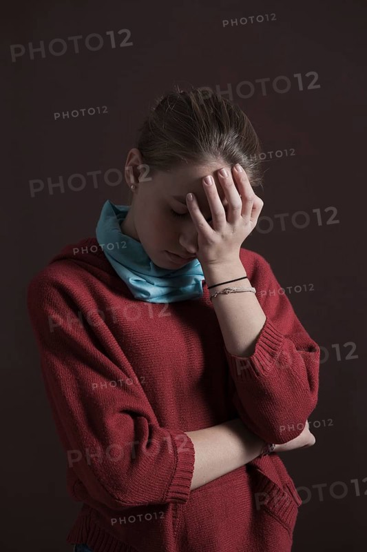 Teenage girl with a thoughtful expression