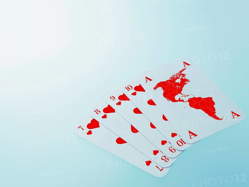 Playing cards with a map of North America and South America