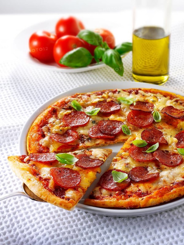 Pizza topped with pepperoni