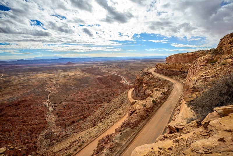 Moki Dugway leads in serpentines through the steep face of the Cedar Mesa