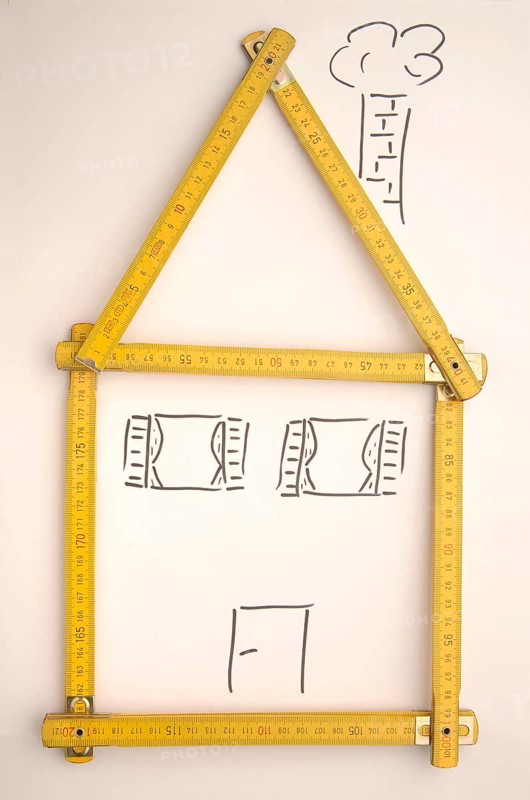 Folding rule in the shape of a house