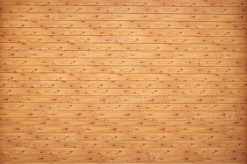 Natural colored wooden wall of rough boards