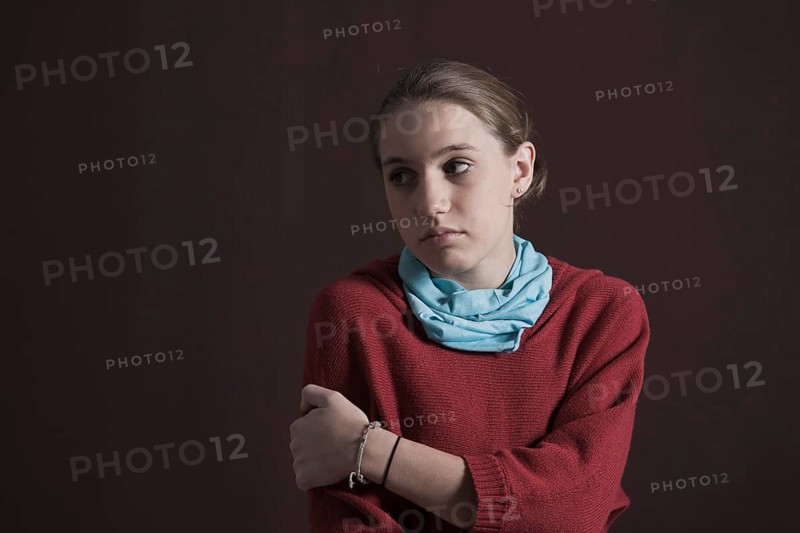Teenage girl with a thoughtful expression