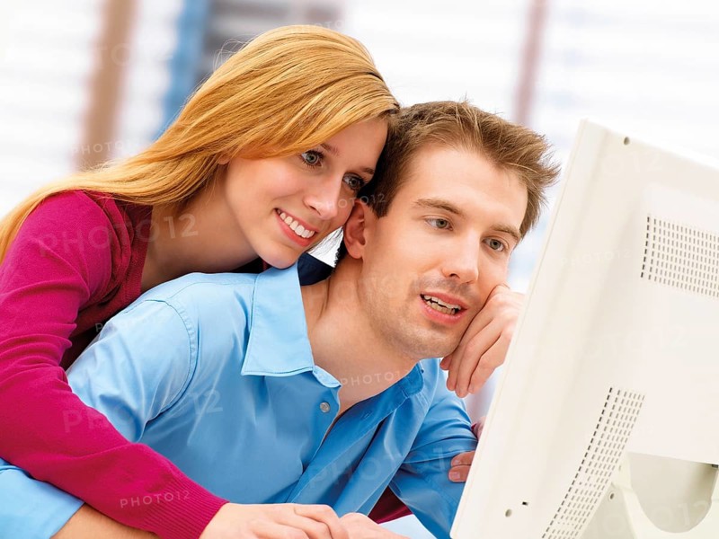 Young couple using a computer