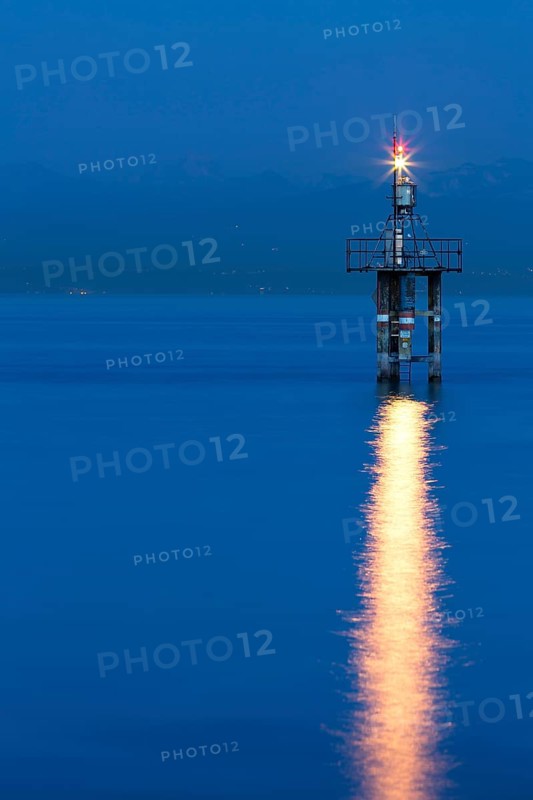 Lighthouse at Hoernle during the blue hour with a stormy atmosphere