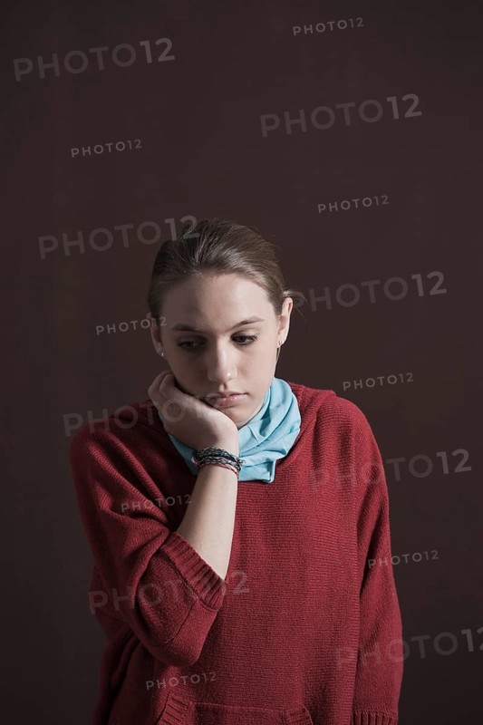 Teenage girl with a thoughtful expression