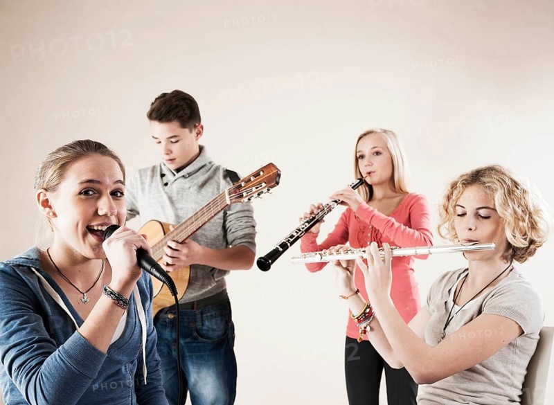 Teenagers making music together