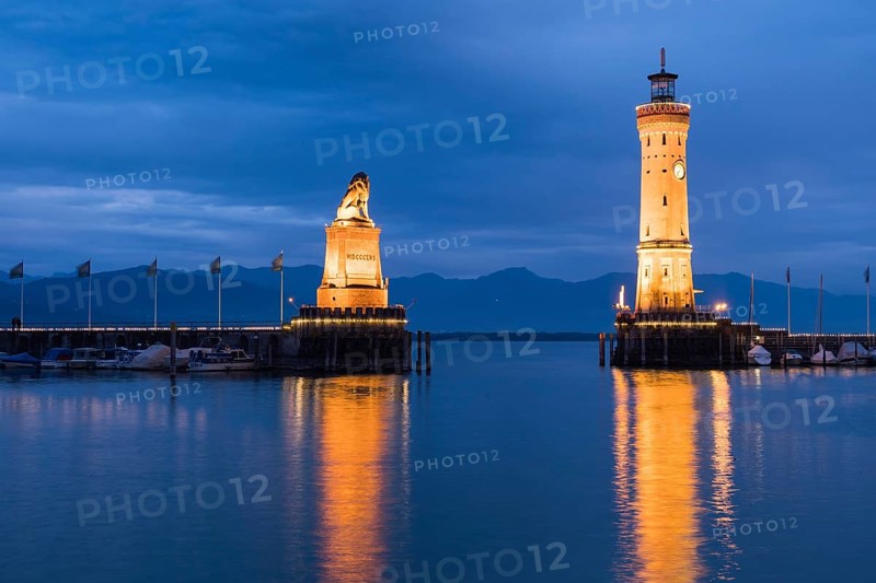 Bavarian lion and lighthouse in the harbour