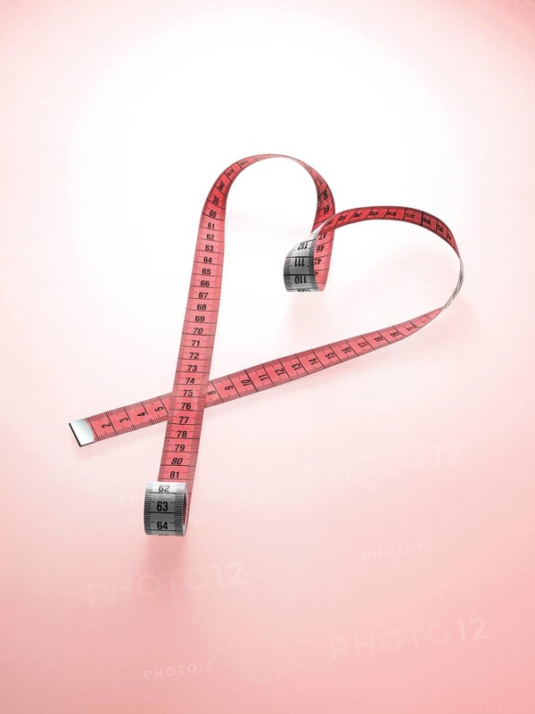 Pink tape measure shaped as a heart