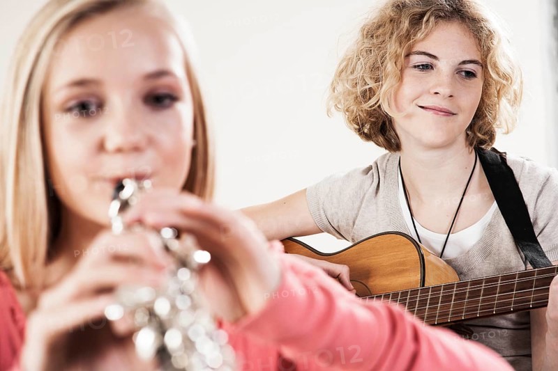 Teenagers making music together