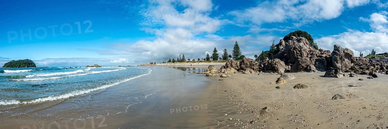 Sandy beach beach of Mount Manganui with island Motiti Island