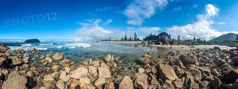 Sandy beach beach of Mount Manganui with island Motiti Island