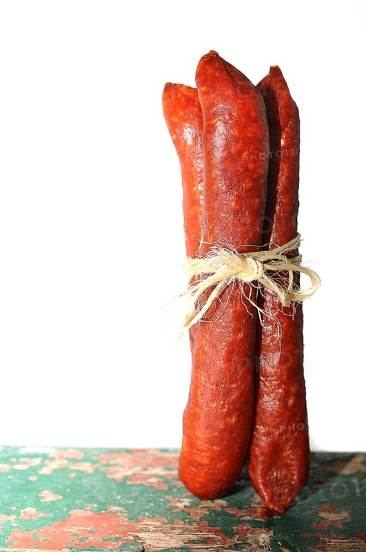 Three salami tied together