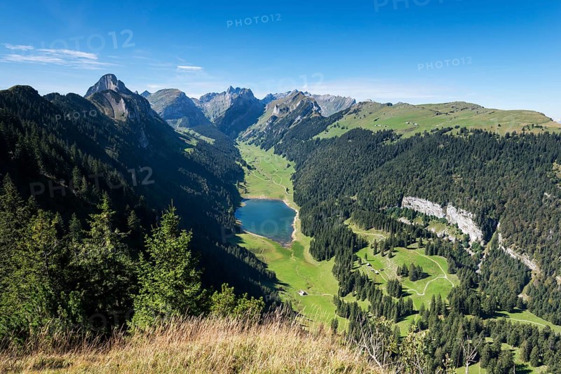 View of the Appenzell Alps and lake Saemtisersee as seen from the geological mountain trail