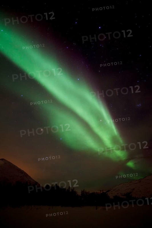 Northern Lights over the Kattfjord pass in winter