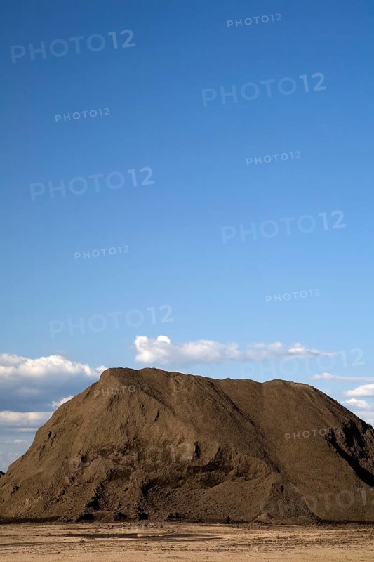 Mound of topsoil in a commercial sandpit