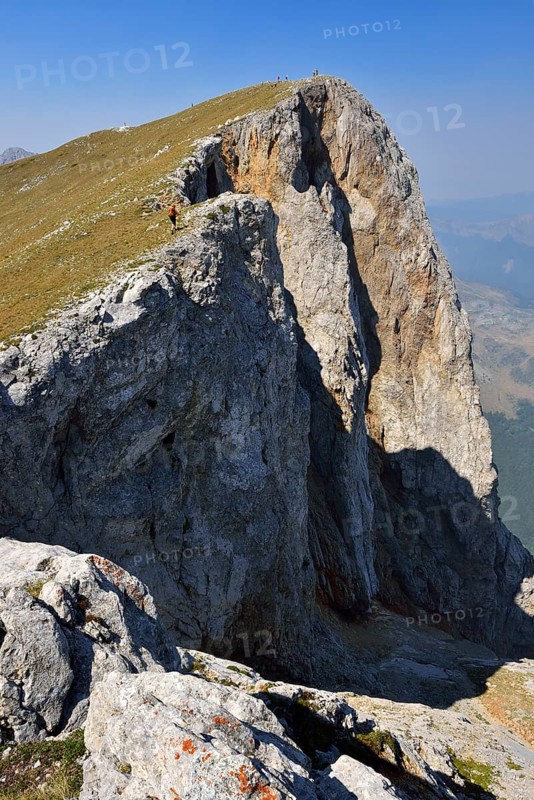 Hiker on the summit of Kom Vasojevicki Mountain
