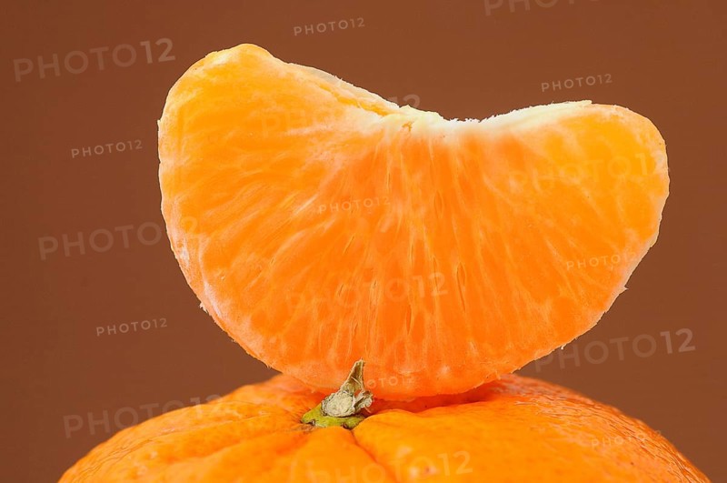 Piece of mandarine on a mandarine