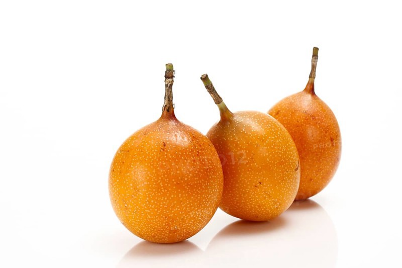 Three Granadillas or Passion Fruit (Passiflora caerulea)