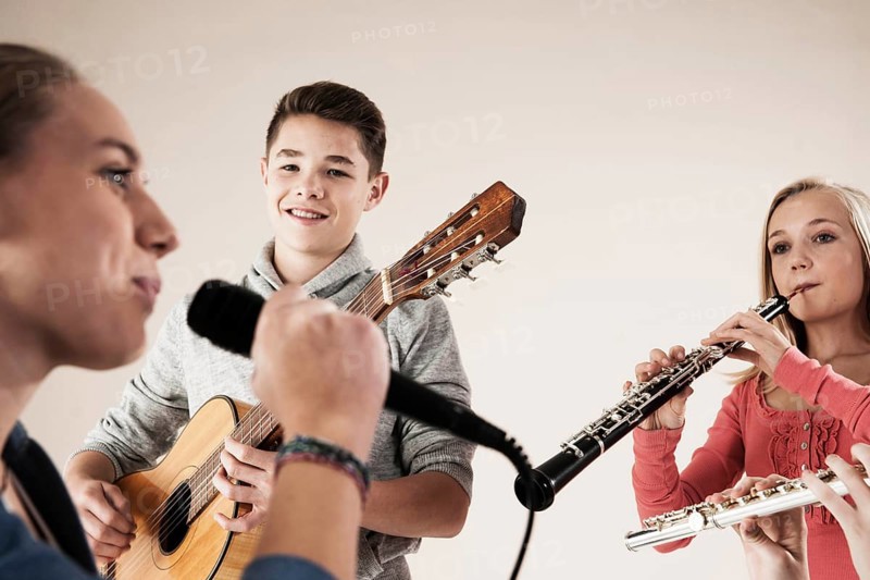 Teenagers making music together