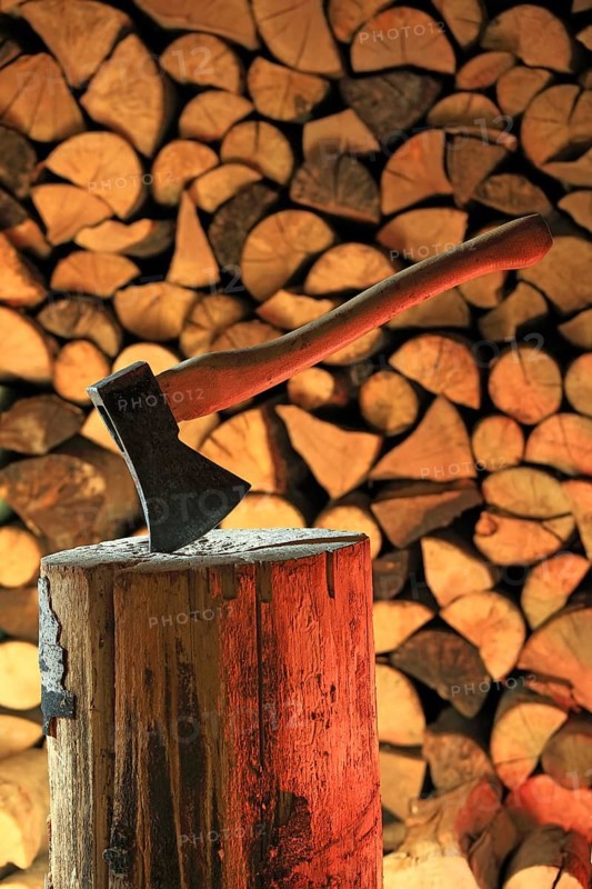 Axe on a log
