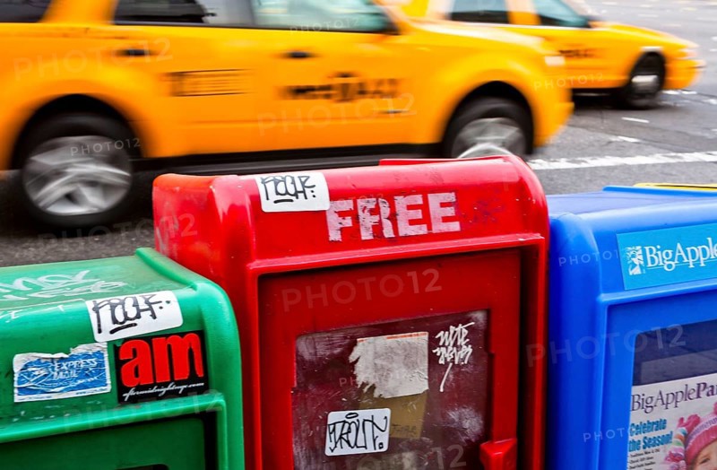 Newspaper vending machines on the roadside