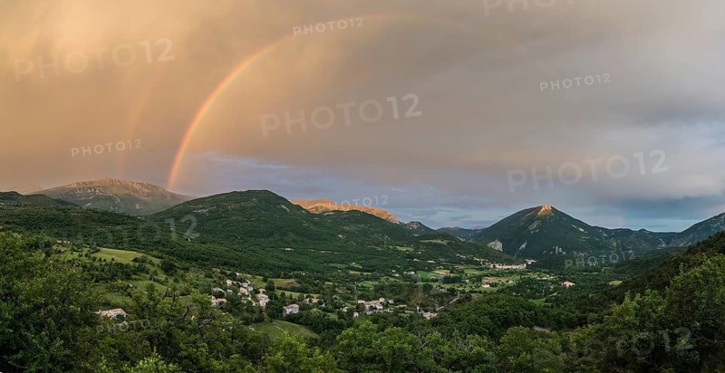 Panorama with rainbow after thunderstorm over the valley of Castellane