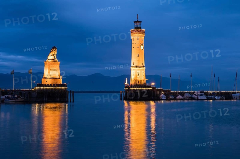 Bavarian lion and lighthouse in the harbour