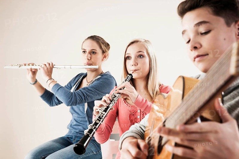 Teenagers making music together