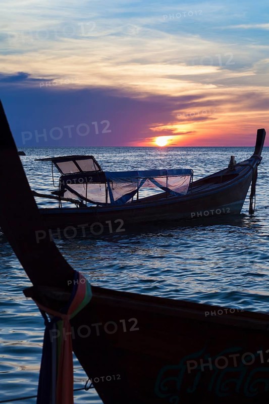 Boats at sunset from sunset beach on Ko Lipe
