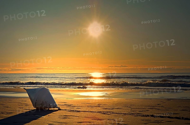 Buoy lying on the beach