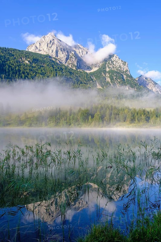 Lake Ferchensee and Wettersteinspitze with early fog