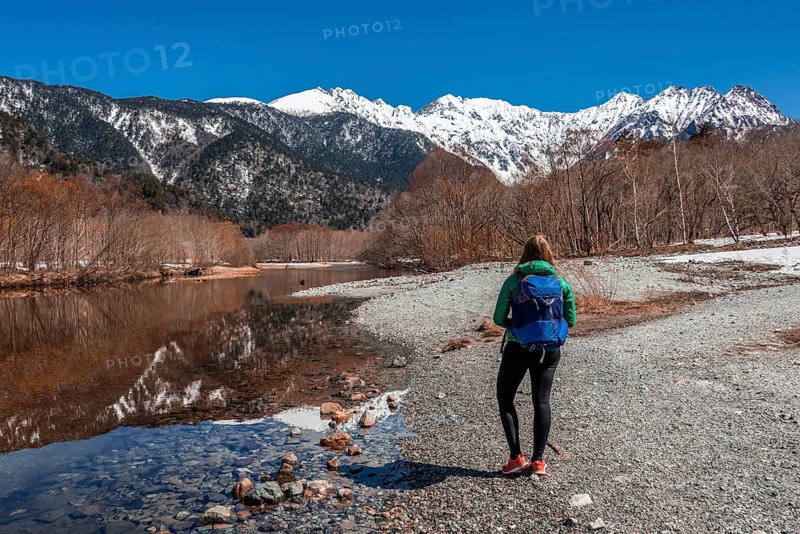 Young woman at a lake