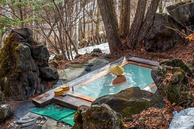 Woman bathing in an onsen