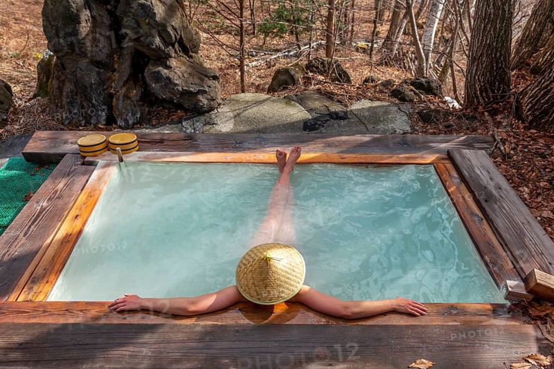 Woman bathing in an onsen