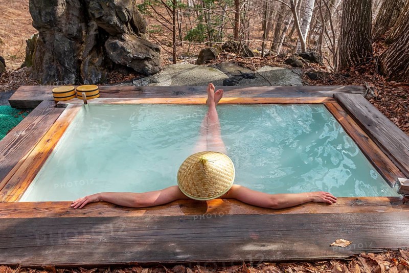Woman bathing in an onsen