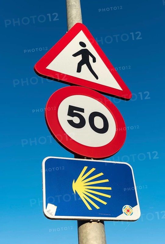 Camino de Santiago road sign with shell symbol