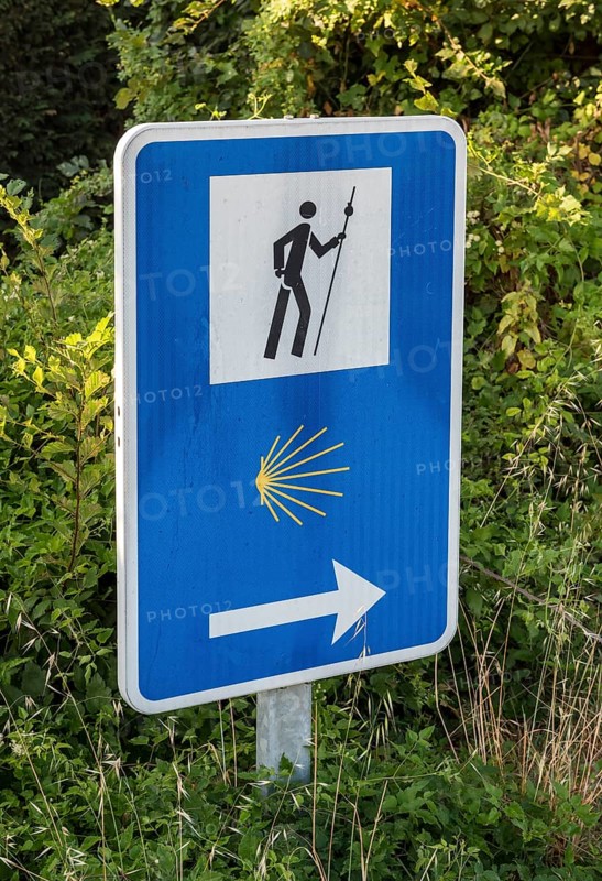 Camino de Santiago road sign with shell symbol