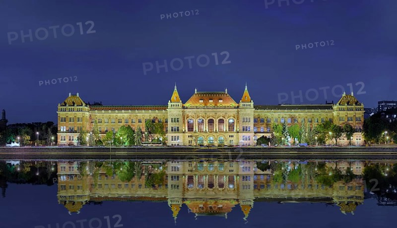 University with reflection in the Danube
