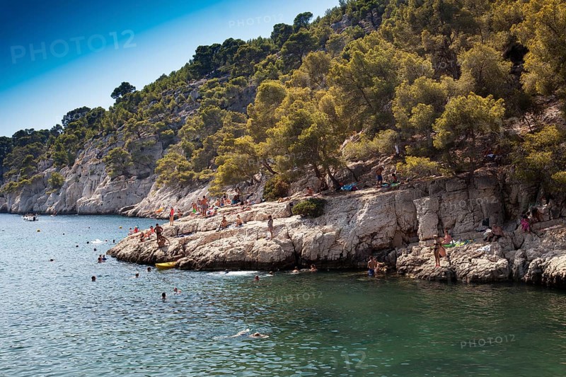 Beach vacationers at the beach in the bay Calanque de Port-Pin