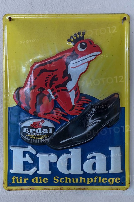Nostalgic metal advertising sign