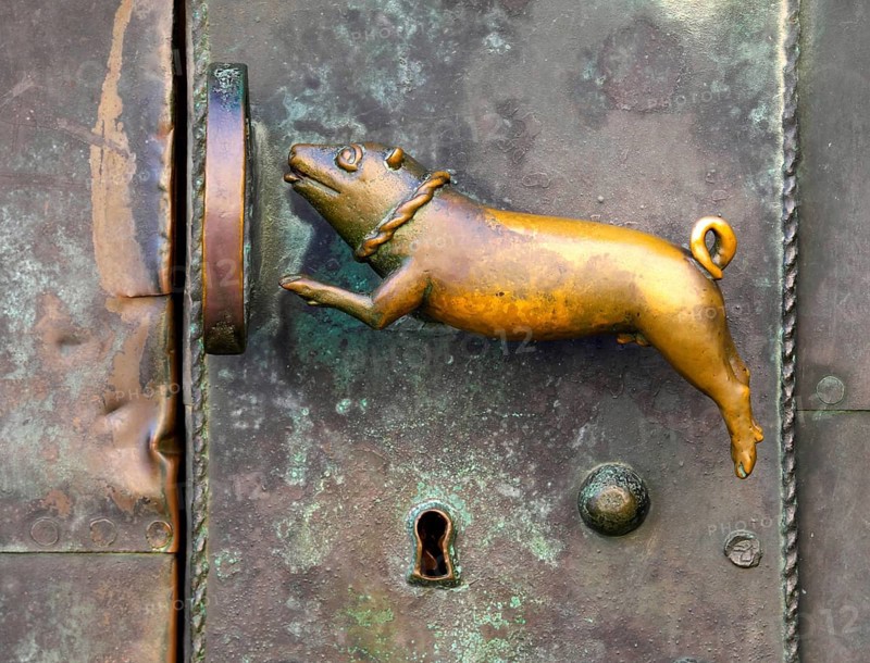 Pig figure as door handle