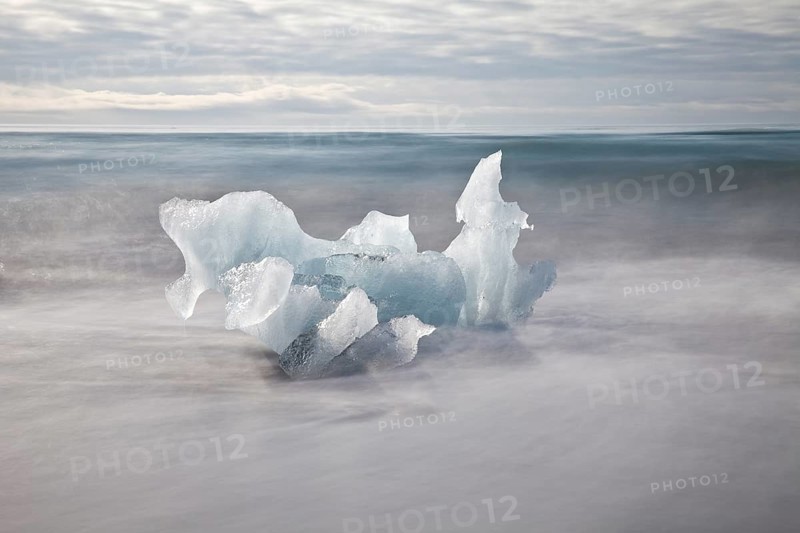 Small glacier icebergs in the surf