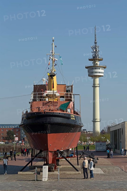 Tugboat Stier at the Museumshafen and Radio Tower