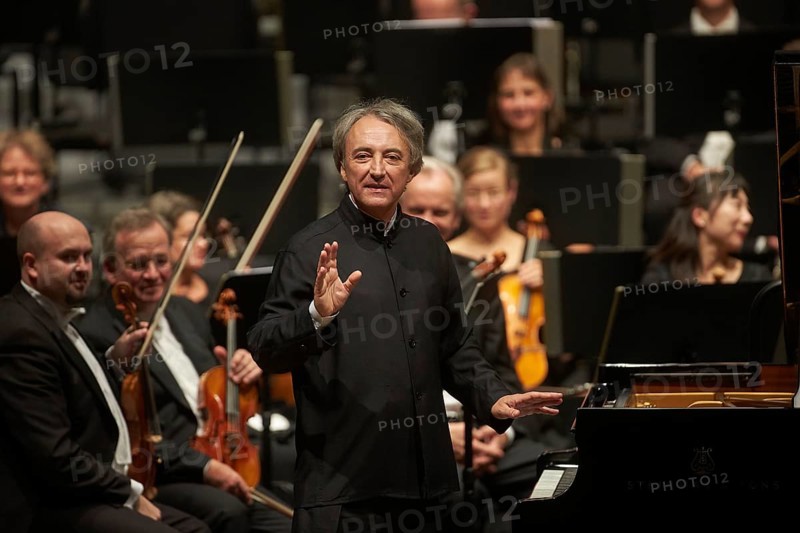 French pianist Jean-Efflam Bavouzet at a concert with the State Orchestra Rheinische Philharmonie